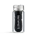 Close-up of Truthpaste charcoal-infused bamboo dental floss